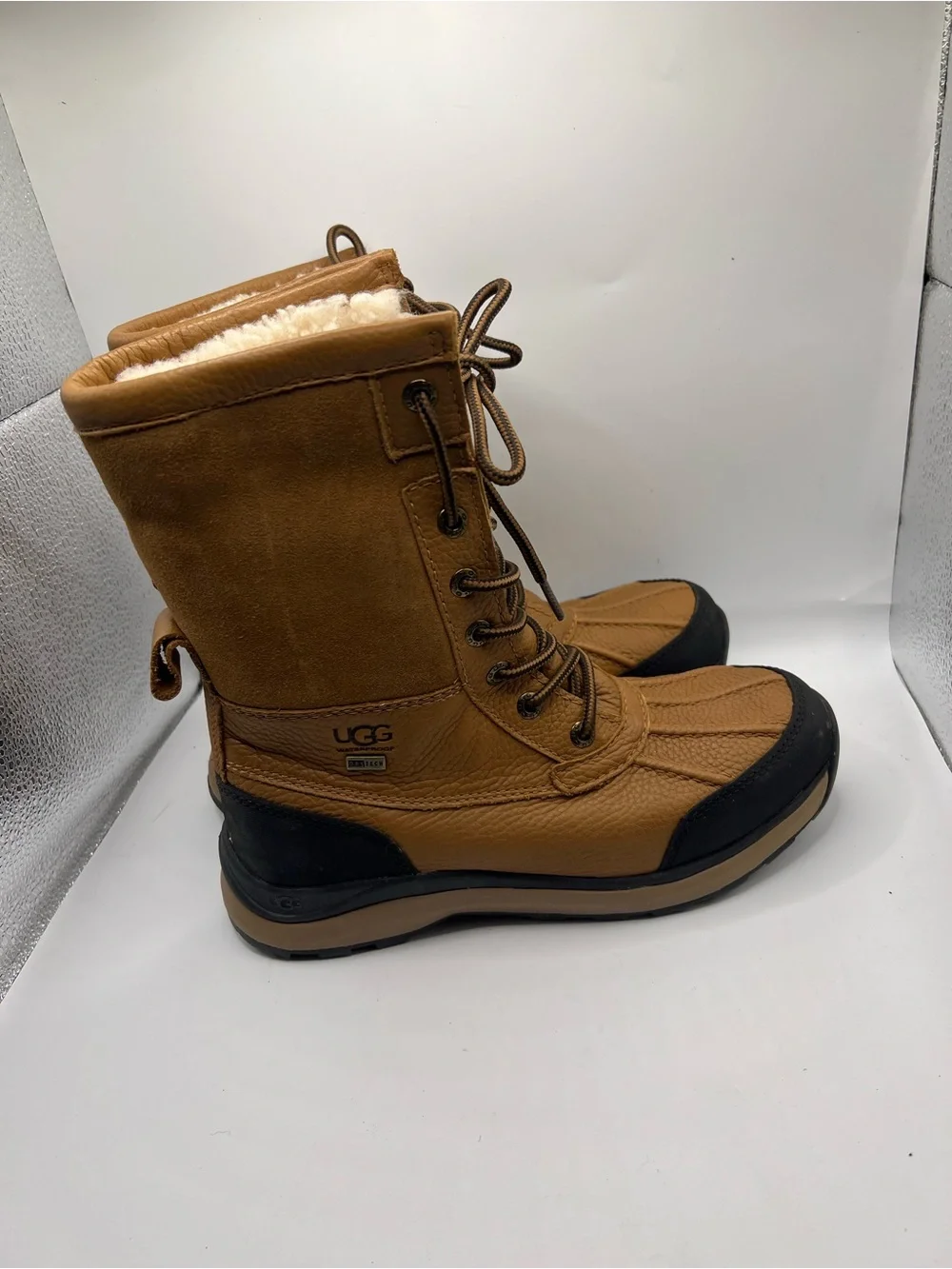 UGG  Tan and Black Waterproof Lace-Up Snow Boots